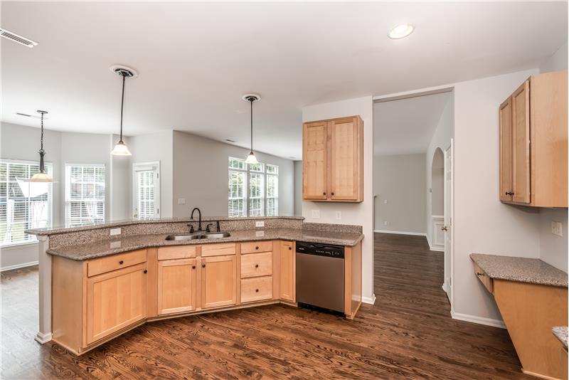 Additional kitchen features: planning desk, under-mount sink with brand new rubbed bronze fixtures, double pantry, recessed ligh