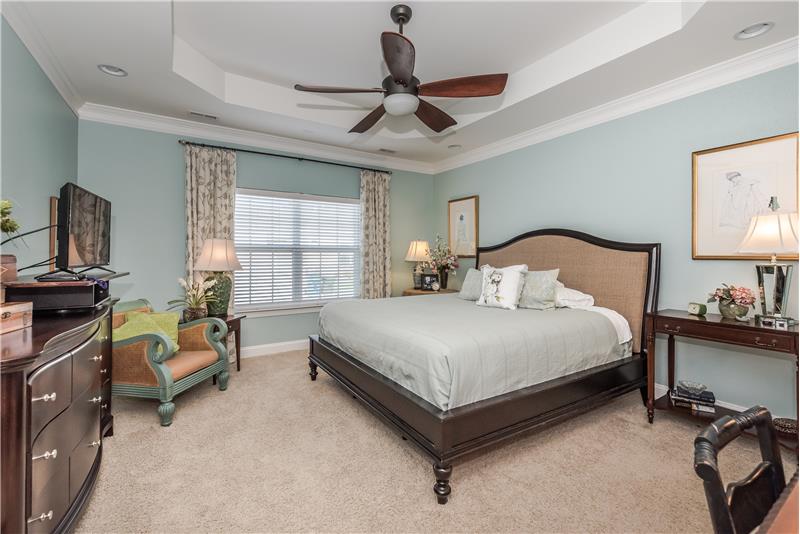 Serene and spacious master suite with room for seating area.