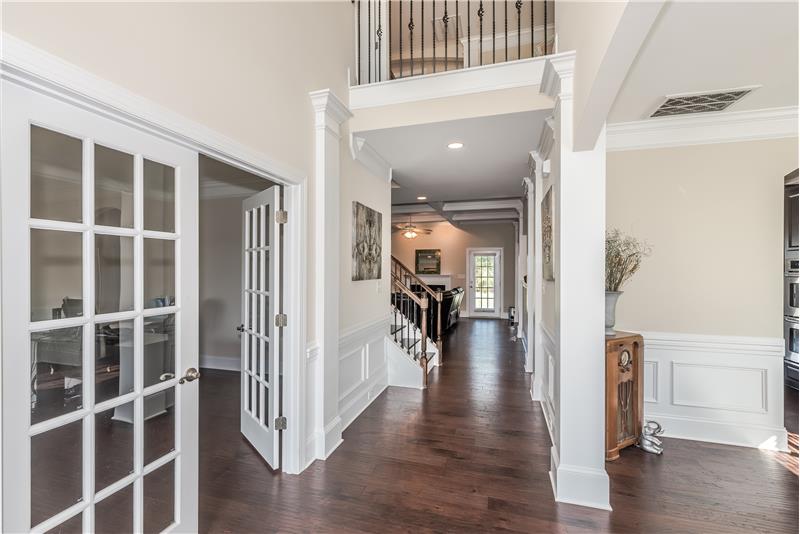 Foyer is flanked by the formal dining room and office. Gorgeous hardwoods, lots of mill-work.