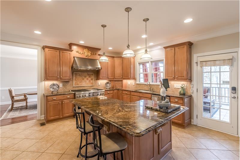 Kitchen features generous counter space, cabinet storage space, and a pantry.