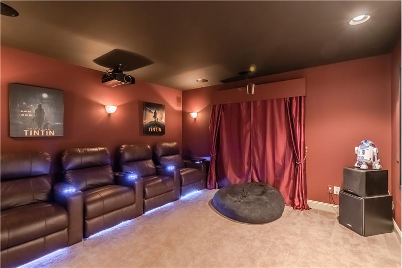 Media room is part of the extraordinary entertaining space on the third floor in the home.