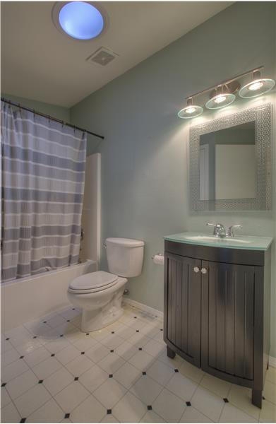 Hall bathroom, adjacent to bedrooms 1 and 2, and perfectly located for guest.
