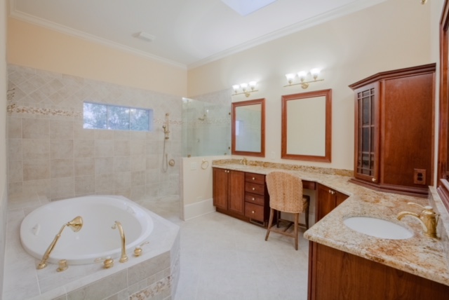 Master bath with jacuzzi tub and free entry walk-in shower.