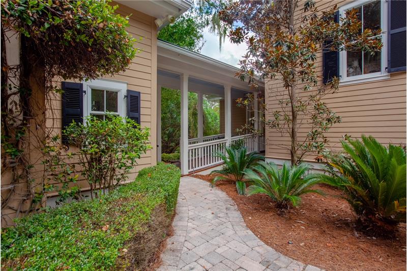 Walkway to mudroom or detached garage.