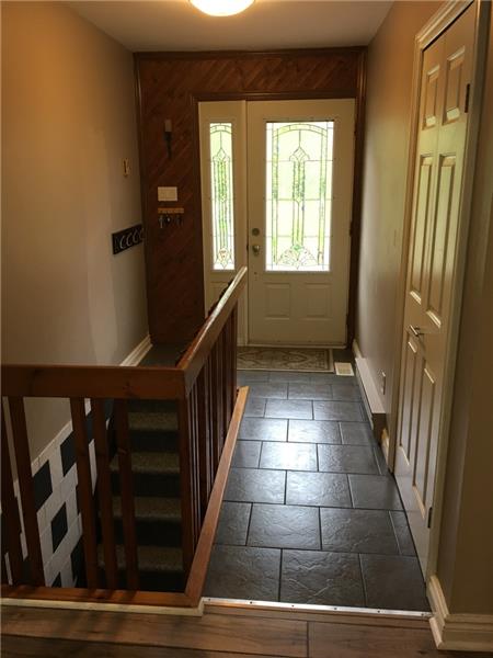 Foyer with Tile Floor and Closet