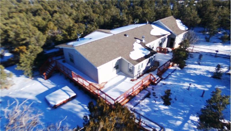 Notice the fencing and walk around deck around the property.