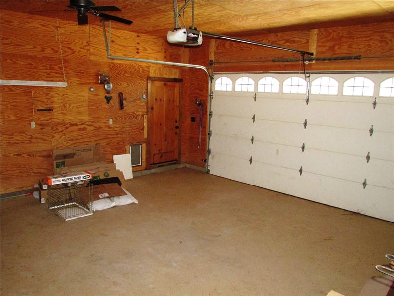 Heated 2 car garage with doggie door