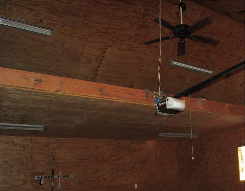 This is the attached 2 car heated garage with doggie door but you have a loft with storage space