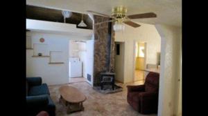 Enjoy the wood burning stove. Notice the loft in the living area