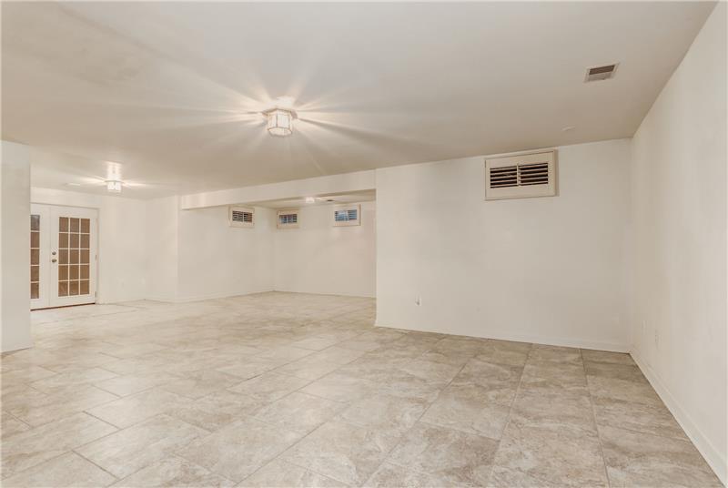Basement Recreation Room with Walk Up Exit
