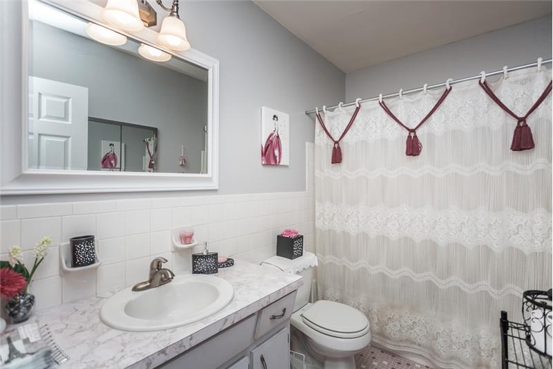 Second bathroom has new fixtures and is conveniently located need to the guestroom