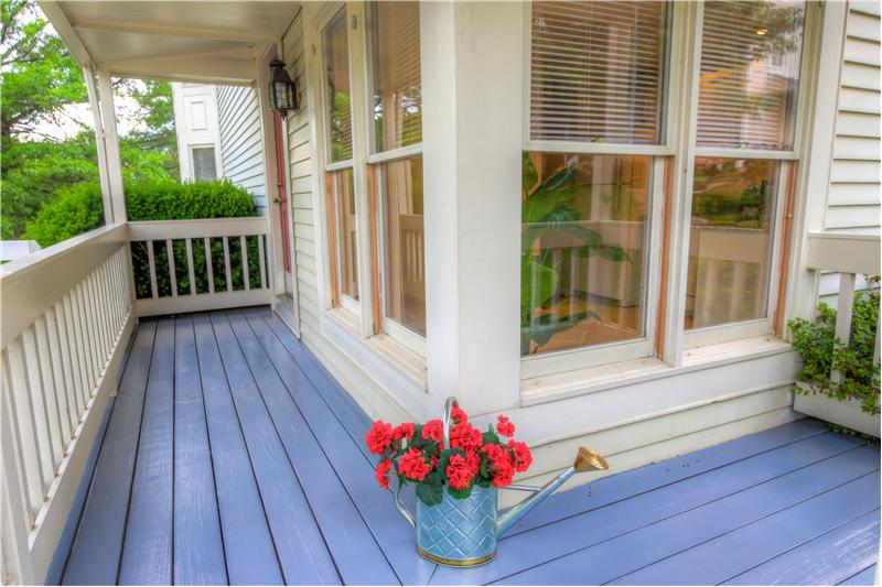 Charming wrap porch with fresh paint!