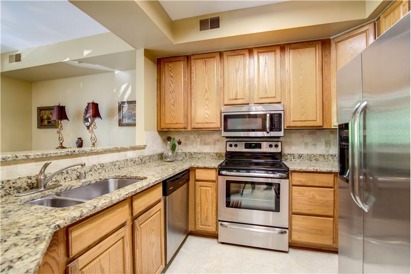 Renovated kitchen with granite and stainless