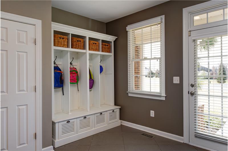 Generous space in mud room w/side porch