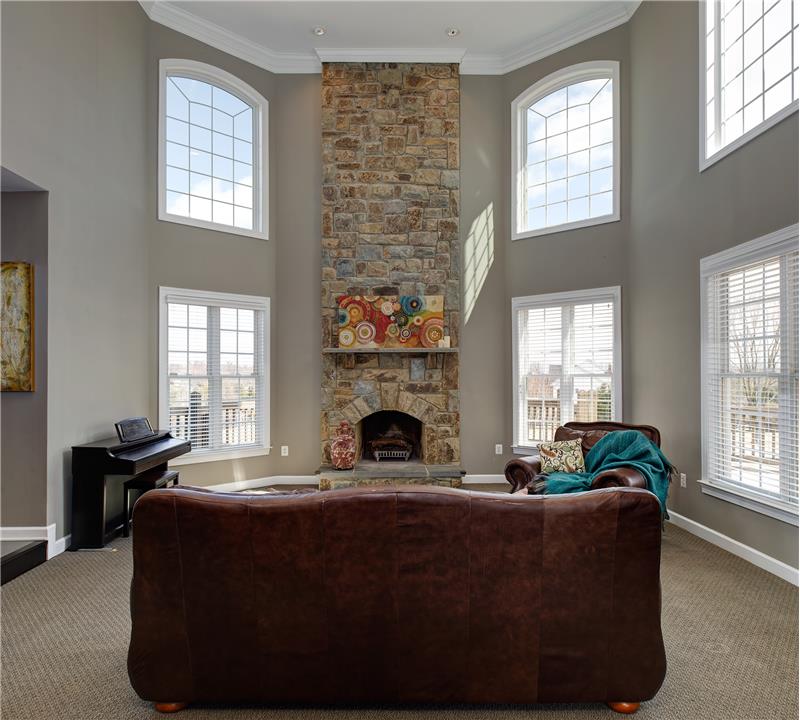 2-story family room w/floor to ceiling stone!