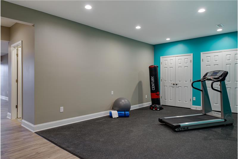 Exercise room complete with rubber gym floor