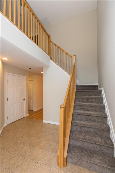 Stairs with New Carpeting leading to 2nd Floor