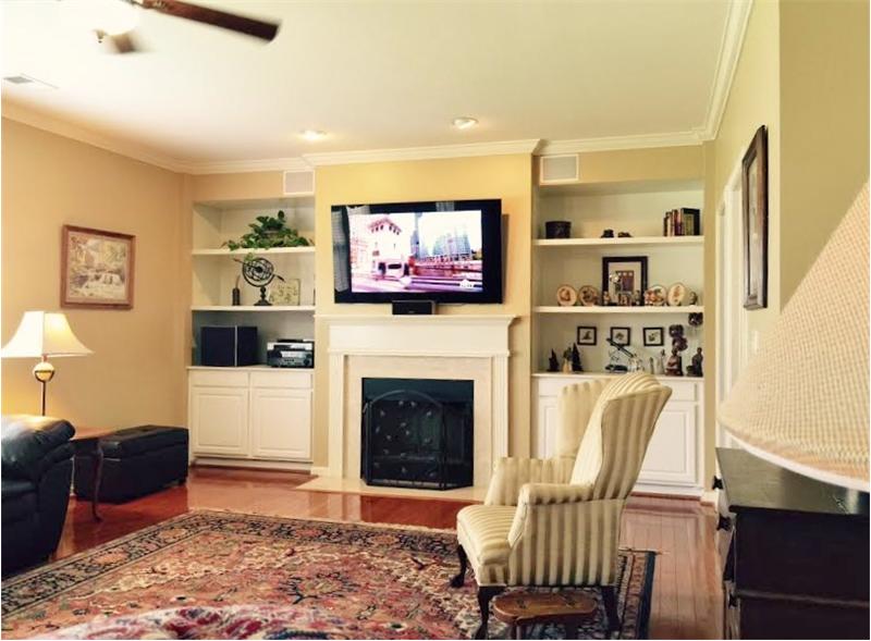 Great Room with Custom Built In Shelving