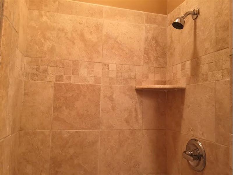 1123 - New Bath Travertine Tile Shower