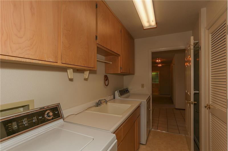 Laundry with deep sink, Dumb Waiter from the Garage to the main floor.