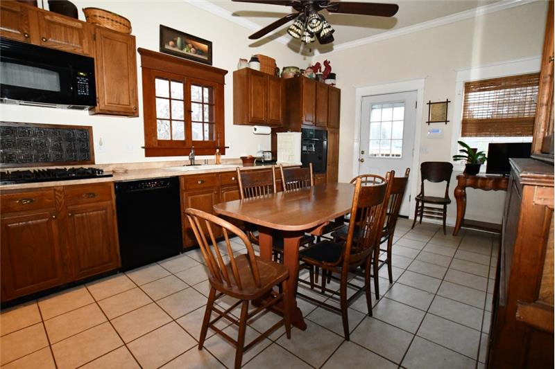Large country eat-in kitchen. All kitchen appliances stay.