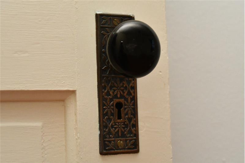 Authentic doorknobs throughout