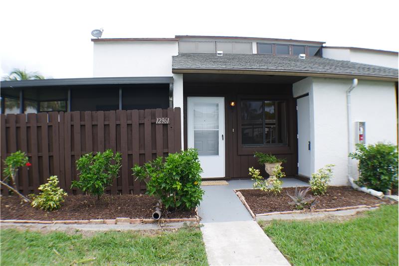 Entrance with locked storage unit
