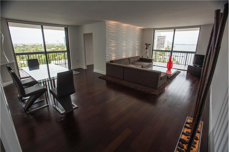 Dining and living room with water views