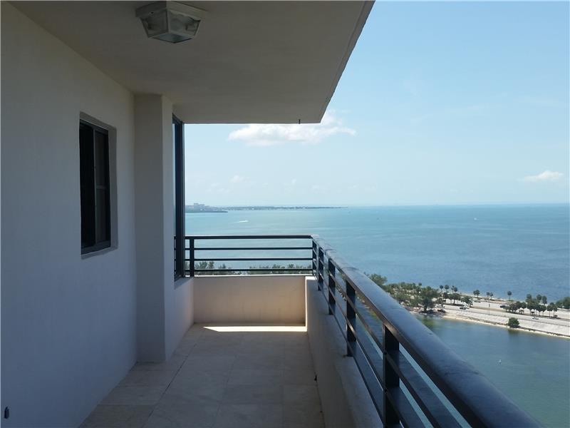 27 ft balcony with water, city and sunset views