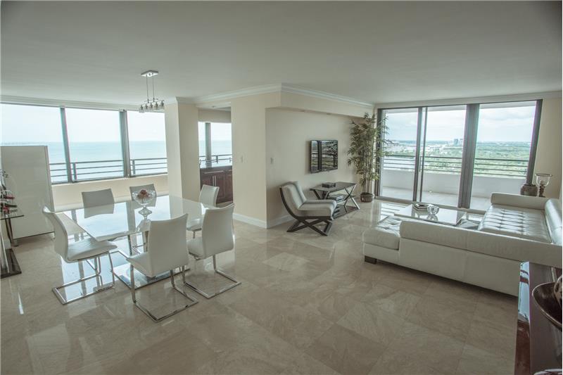 Living and dining with water views