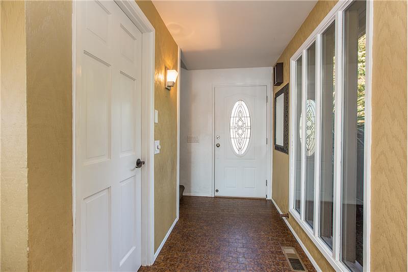 Inviting Entry with Loads of Natural Light and Includes a New Front Door.