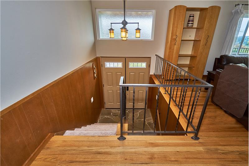Inviting Entry with Newer Light Fixture.