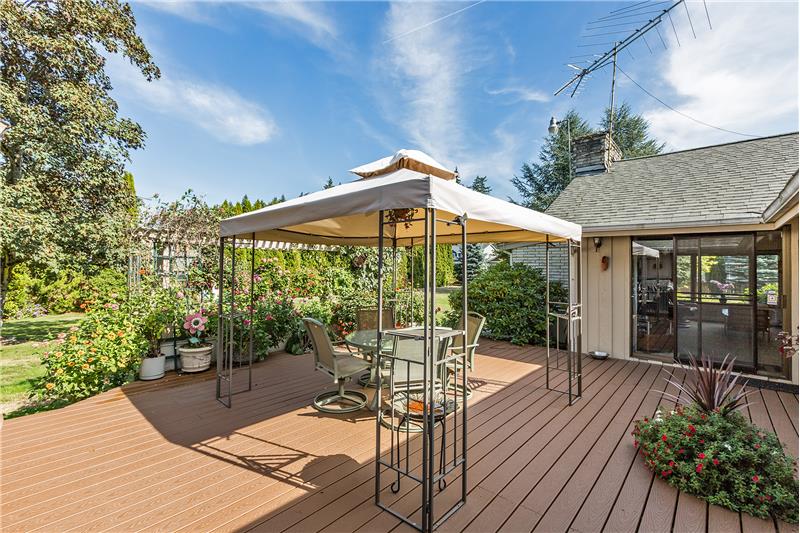 Large Trex Deck that Overlooks the Lovely, Very Private Landscaping. Great for Entertaining.