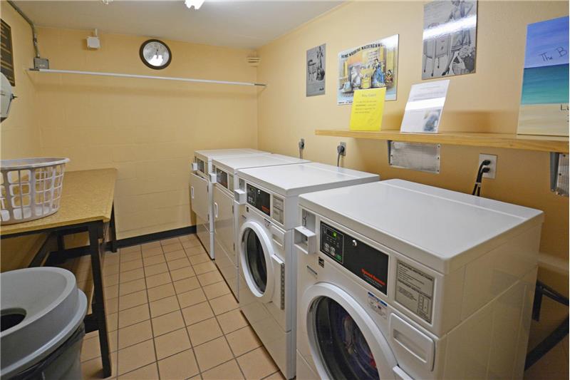 High efficiency laundry in each building