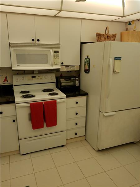 Kitchen stove and refrigerator