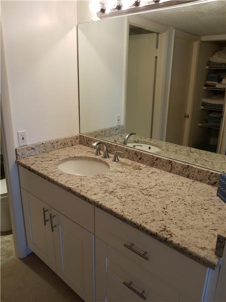 Newer vanity with granite counter in Master bath