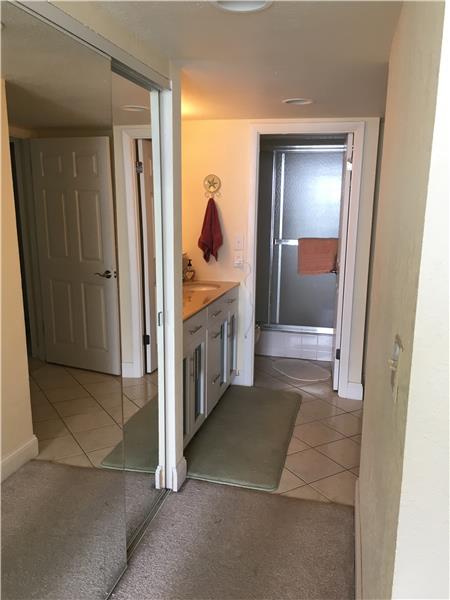 Spacious dressing area with ample closet space.