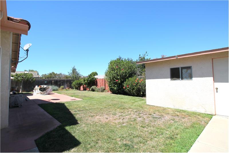 Back Yard With 12x8 Workshop Stuccoed to Match Home