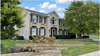 The experience at 4 River Bend Road begins before you reach the front door. Across from the property, views of the Fox River