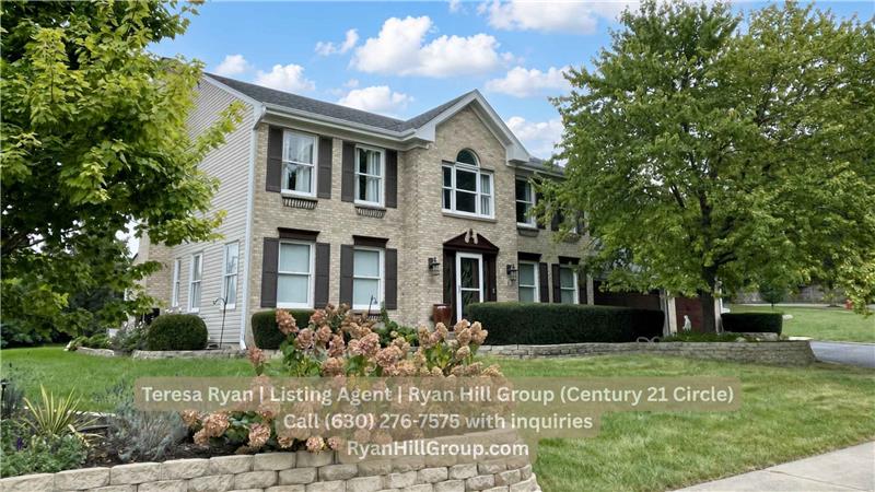 The experience at 4 River Bend Road begins before you reach the front door. Across from the property, views of the Fox River