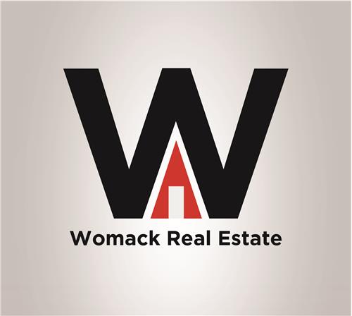 Womack Real Estate logo