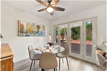 INVITING ENTERTAINING SPACE WITH VIEWS OF YOUR SPACIOUS BACKYARD & DECK!!