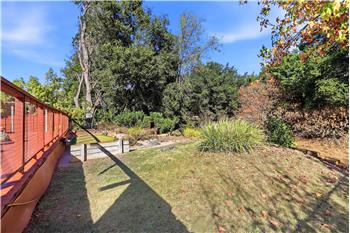 EXPANSIVE YARD SPACE, GREAT FOR ENTERTAINING, GARDEN SPACE OR PLAY AREA!!