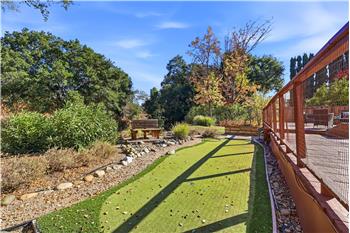 LOW-MAINTENANCE LANDSCAPING IN FRONT & BACK YARDS!!