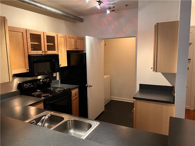 Laundry Closet off of Kitchen